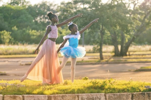 2 girls playing ballerina