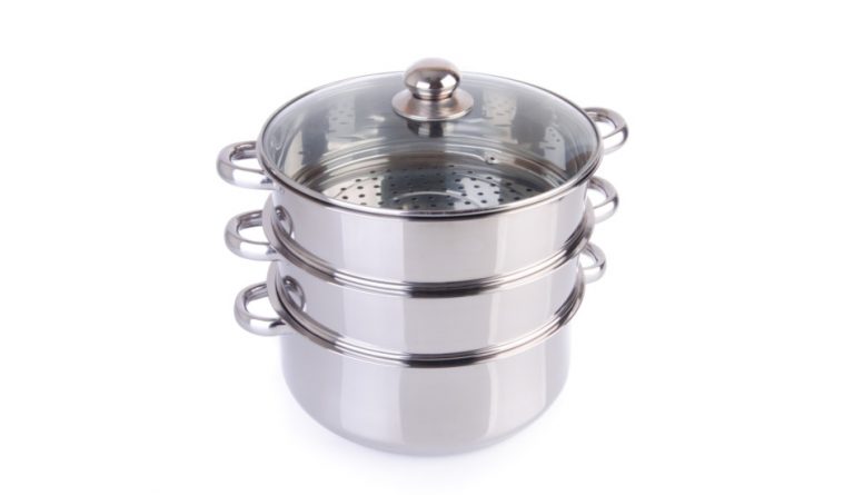 Stainless steel steamer pan for preparing steamed eggs.