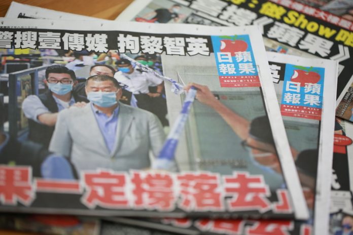 Peaceful and Heroic stand: Jimmy Lai makes headlines in his own newspaper and stands shoulder to shoulder with the people of Hong Kong in their hour of need.