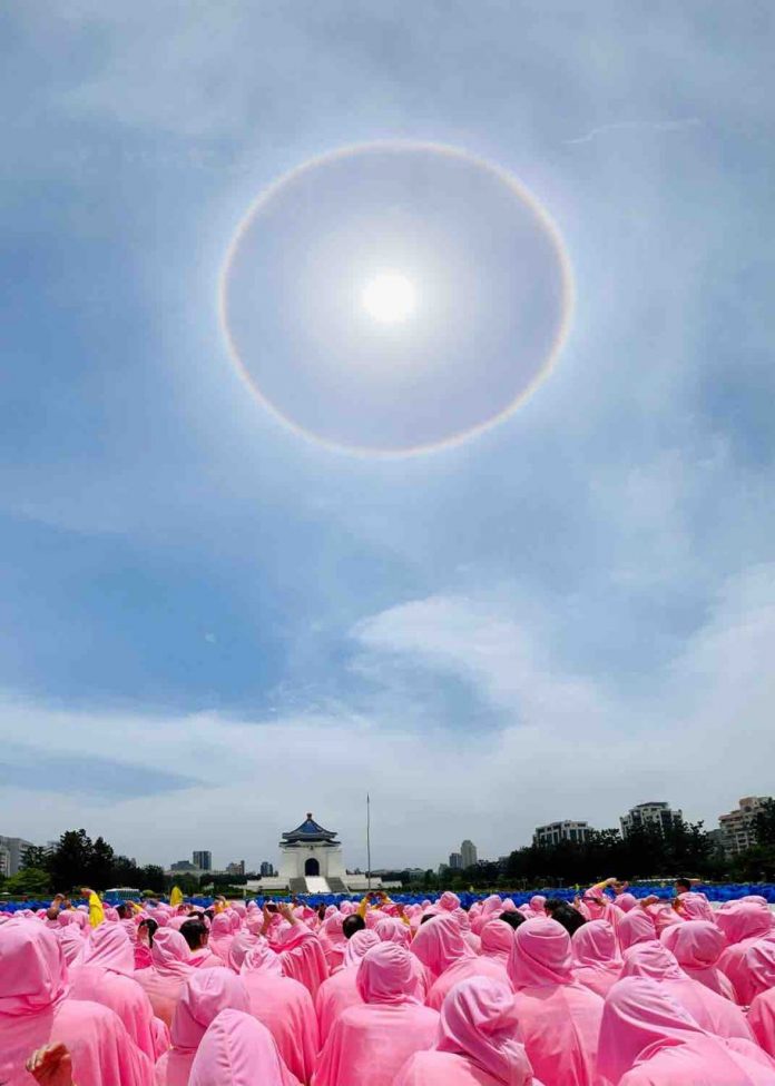 An amazing sun halo with rainbow colors surprisingly appeared in the sky.