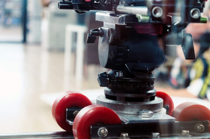 Close up view of dolly track for camera equipment.
