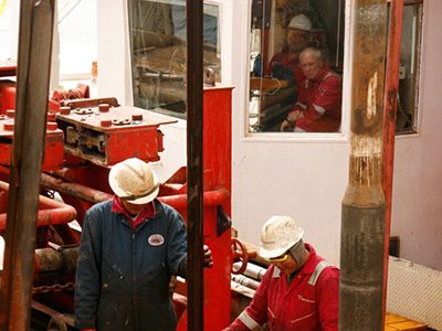 Crew members abroad the research vessel JOIDES Resolution drilled sediment cores from the seafloor in the Bering Sea to find past dead zones.