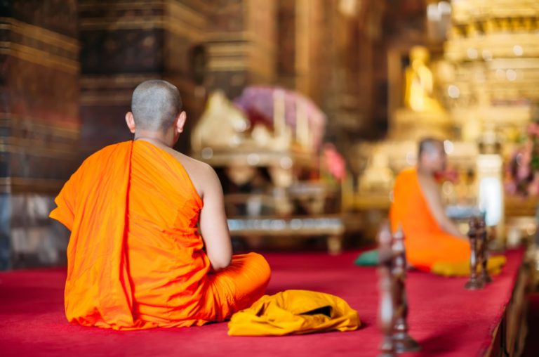 Thai Buddhist monks are performing tree ordinations.