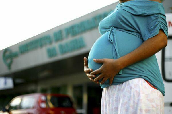 Pregnant woman is seen at the entrance of the Bahia Perinatology Institute in Salvador, Brazil.