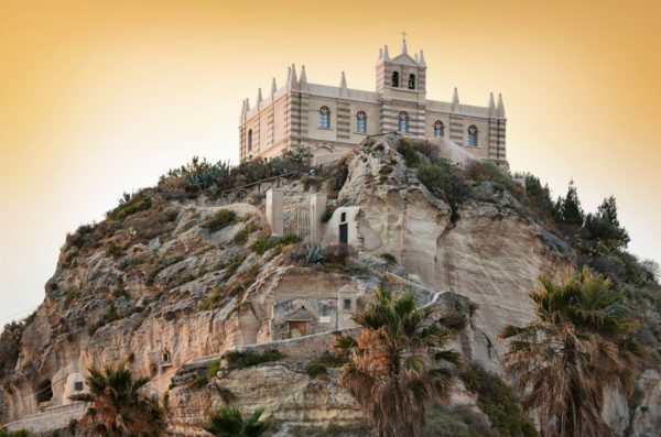 Sitting atop a cliff, the Cathedral of Santa Maria del Isola, Tropea, Italy.