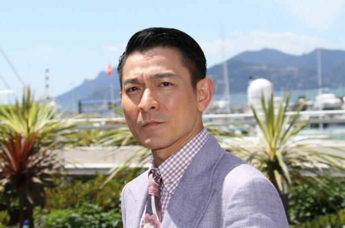 Chinese actor, Andy Lau, poses for photographers at the 2013 Cannes Film Festival.