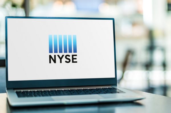 Laptop computer displaying logo of The New York Stock Exchange.