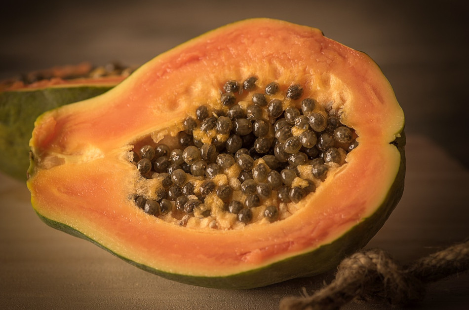 Half of a sliced papaya.