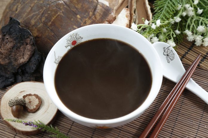 A bowl of Chinese black bean soup.
