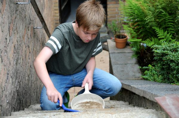 Iowa teens were doing yard work like cleaning the stairs.