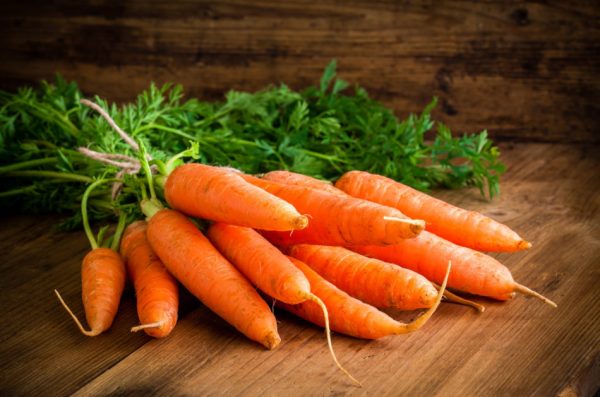 Rainbow eating includes carrots; orange carrots contain lycopene.