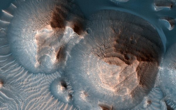 The photo shows evidence of ancient volcanic eruptions on Mars from a supervolcano.