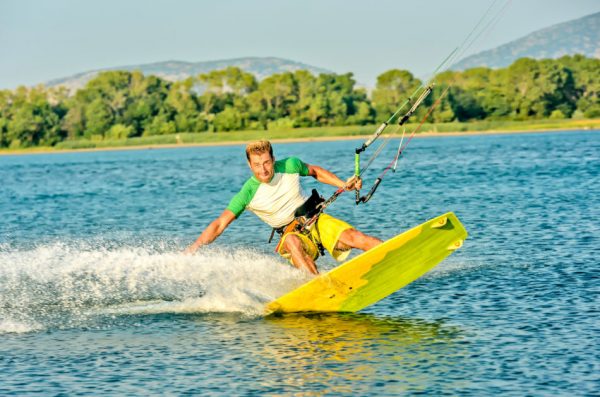 Enjoy the healing power of the sun while kiteboarding.