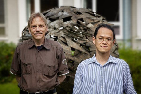 Prof. Dr. Ulf-G. Meißner (left) and Dr. Chien Yeah Seng (right) say there is evidence a new physics is required to replace the Standard Model.