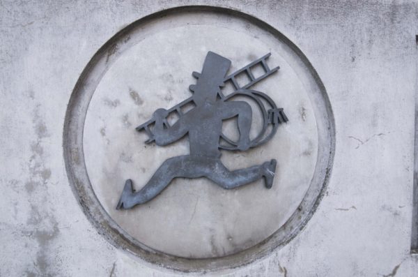 Symbol of a chimney sweep as a good luck charm.