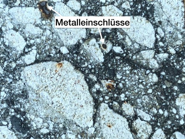 Apollo sample 60335 with visible metal globules: These metal globules come from asteroids that have hit the Moon.