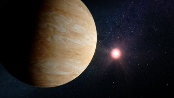 Illustration showing what exoplanet GJ 1214 b could look like based on current information. GJ 1214 b, a warm sub-Neptune-sized exoplanet roughly 48 light-years from Earth, is one of the most studied exoplanets in the galaxy. Previous spectroscopic observations indicate that the planet is shrouded in aerosols (clouds or haze), which have thus far made it impossible to determine the composition of gases that make up its thick atmosphere. It is hoped the James Webb Space Telescope will be able to resolve this.