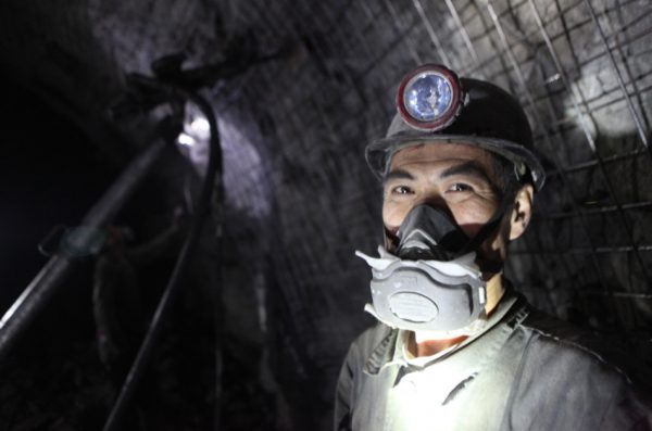 A Chinese mine worker in the mine.
