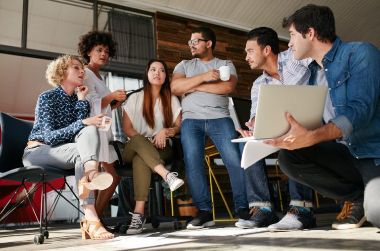 Group of coworkers having a project meeting.