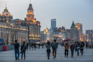 People walking at the Bund in Shanghai, China.