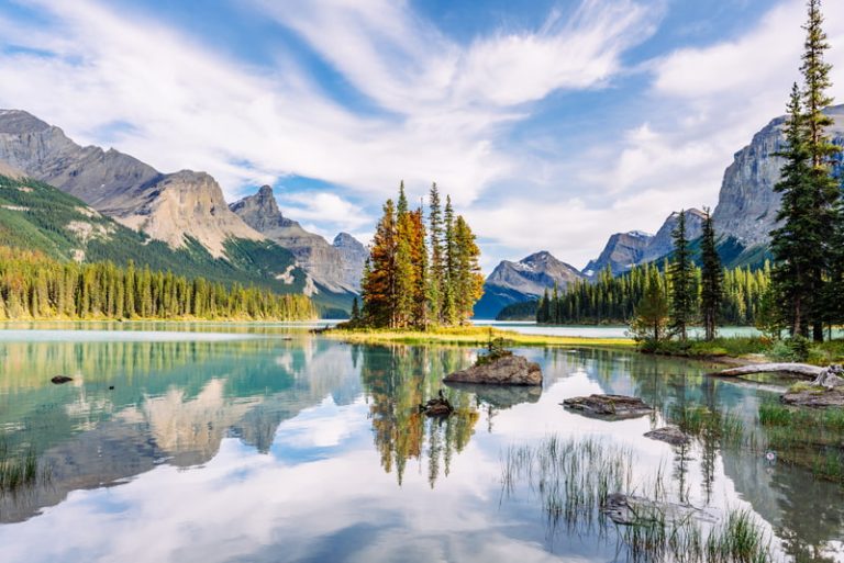 Maligne Lake and Spirit Island on a sunny summer day in Jasper National Park, Alberta, Canada.