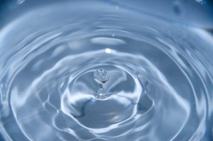 Drops of water causing ripples.