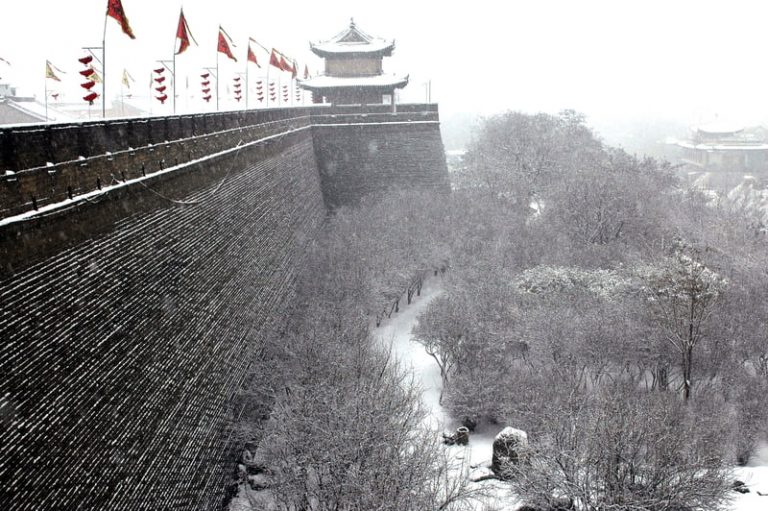 The ancient city wall of Xi'an, China seen during a snowstorm.