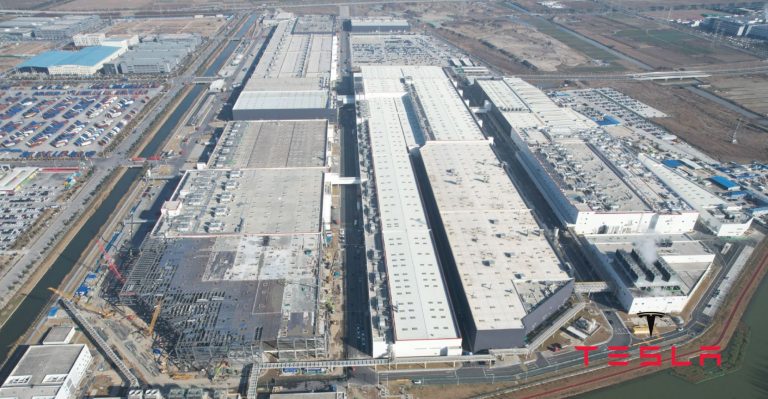 In Shanghai, Tesla's massive gigafactory produces 21,000 electric vehicles per week that the U.S. automaker delivers globally.