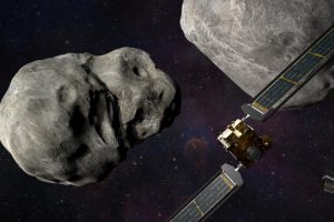 Illustration of NASA’s DART spacecraft and the Italian Space Agency’s LICIACube prior to impact at the Didymos binary system.