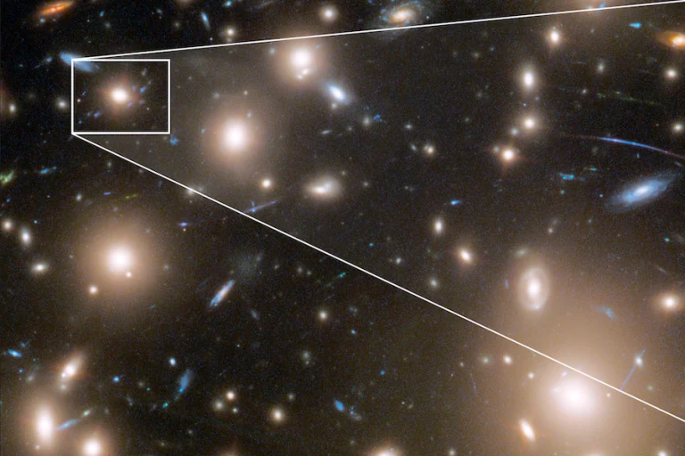 The above image shows the light from the supernova behind the galaxy cluster Abell 370.