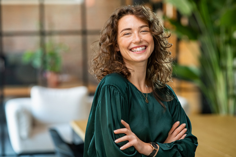 Young woman smiling.