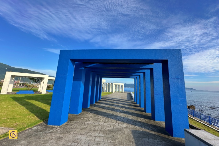 Visitors can stroll beneath the elegant archways, taking in the picturesque ocean views and the intriguing rock formations that line the shoreline.