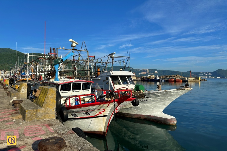 The nearby Wanli Fishing Harbor is a charming spot known for its coastal scenery and fresh seafood.