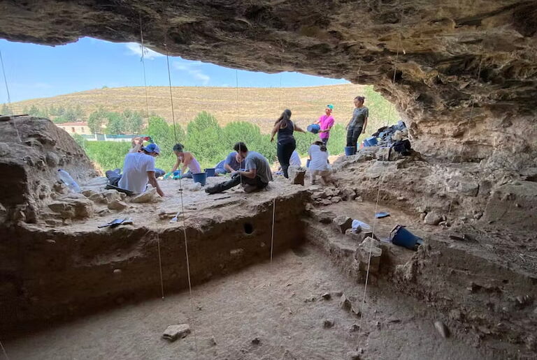 The archaeological team working at the Abrigo de San Lázaro site, where the Neanderthal-marked stone was found.