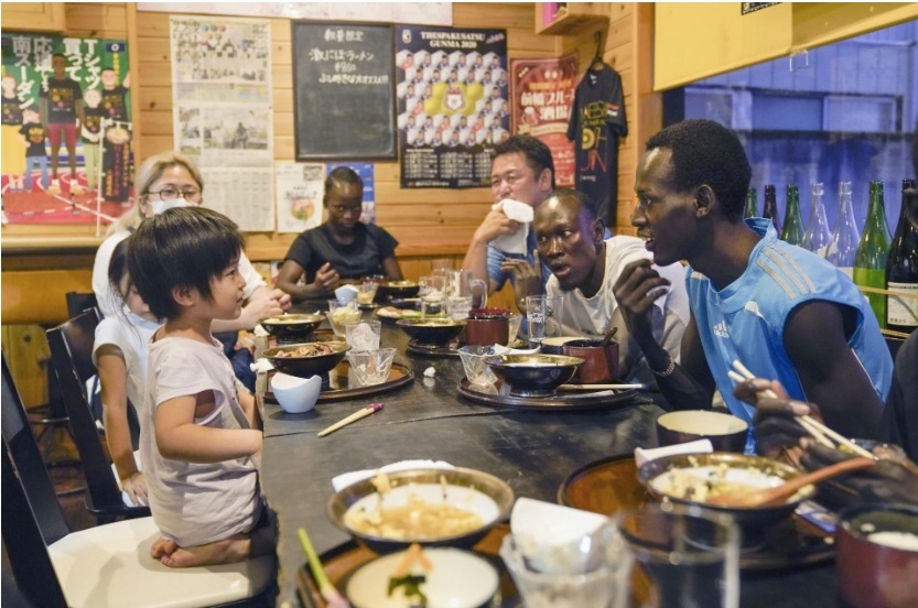 Akoon Akoon, Lucia Moris, and Abraham Guem were poor Olympic athletes that had dinner with the owner's family at a Japanese restaurant.
