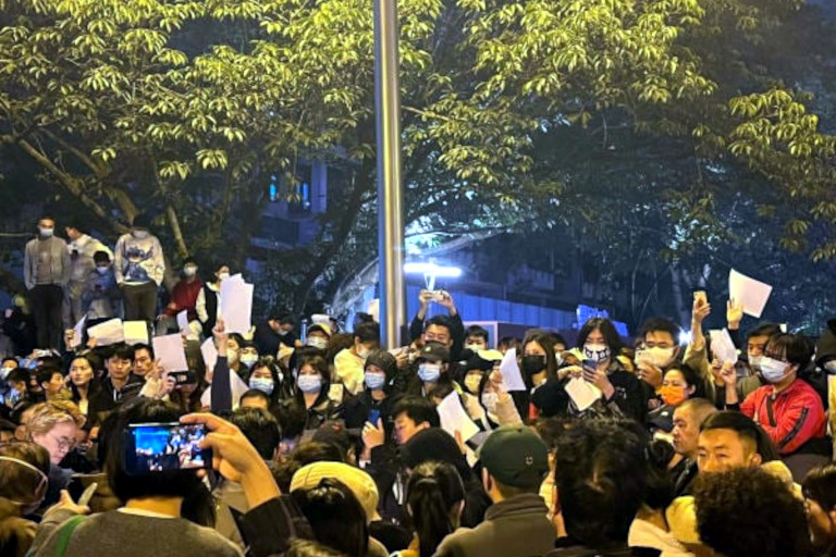 Protesters soon began holding up blank sheets of paper, symbolizing censored voices.