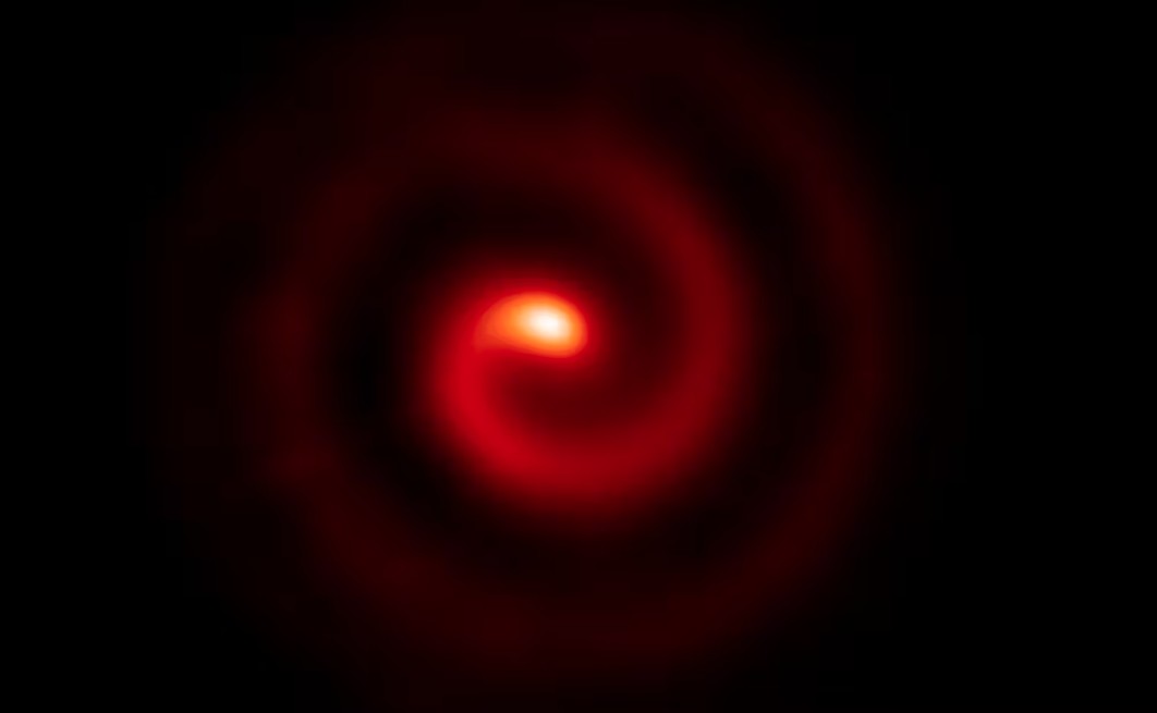 The ‘pinwheel’ nebula of the triple Wolf-Rayet star system WR104