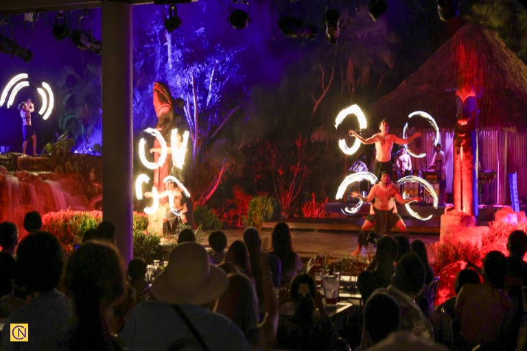 Flames and rhythm unite in the dazzling fire dance, the highlight of Guam’s cultural dinner show.
