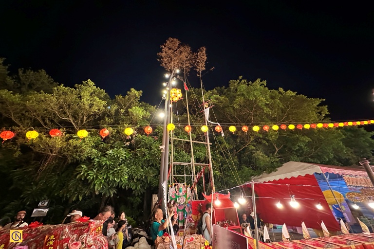 Bamboo, seen as a 'spirit antenna,' guides wandering ghosts to the offerings.