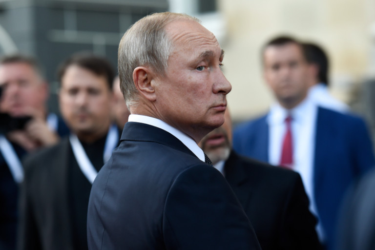 Vladimir Putin arriving at a meeting in Armenia.