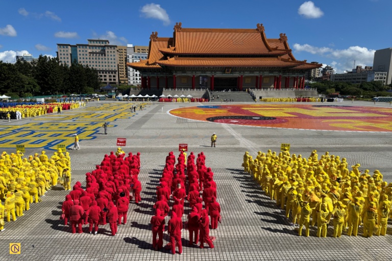 Thousands of participants enter their assigned positions from the four sides of the plaza in an orderly procession.