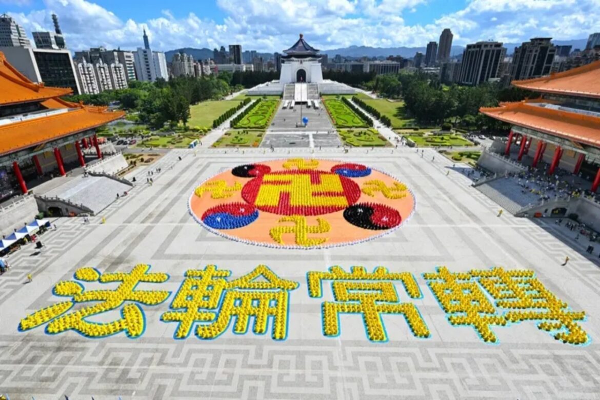 Approximately 5,000 Falun Gong practitioners form the Falun emblem and four Chinese characters at Liberty Square in Taipei, Taiwan, on October 18, 2025.