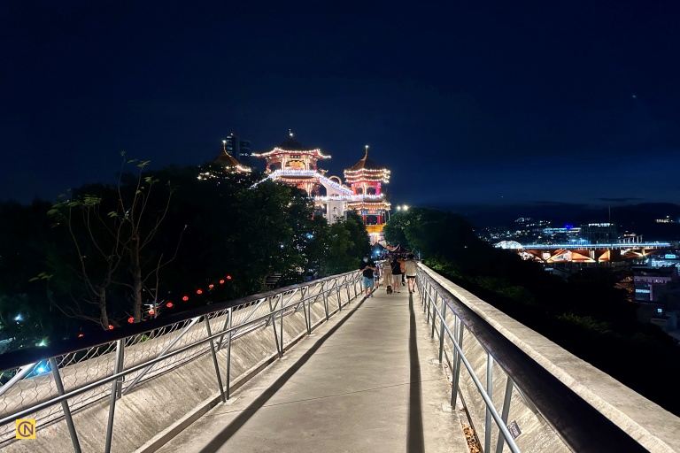 The elevated corridor offers sweeping views of Keelung Harbor, the mountain ridges, and the city’s bustling streets below.