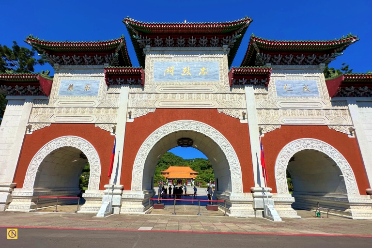 The main entrance features a majestic triple-arched gateway.