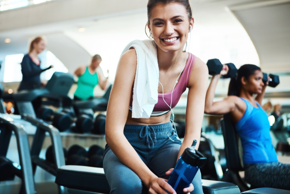 A group of women working out in the gym.
