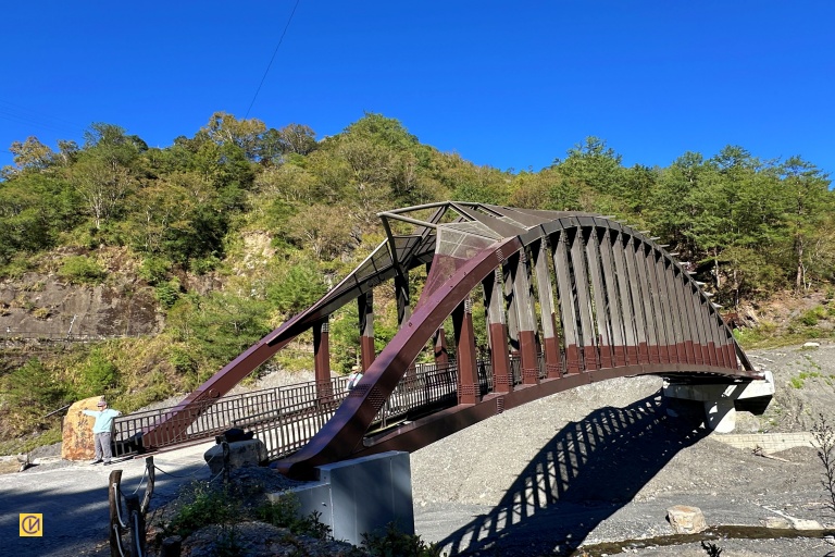 The Aowanda Qingshuixi Bridge offers tranquil views of the clear Qingshui Stream and the surrounding forested valley.