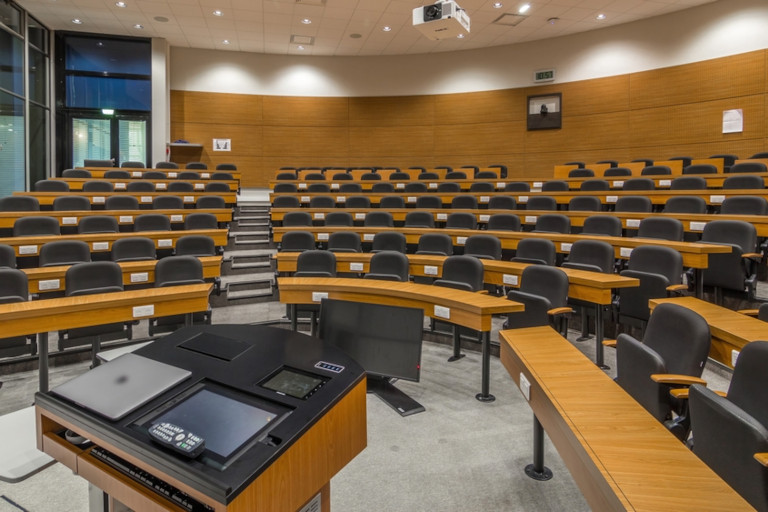 An empty college lecture hall.
