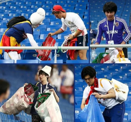 Picking up trash as soccer match.