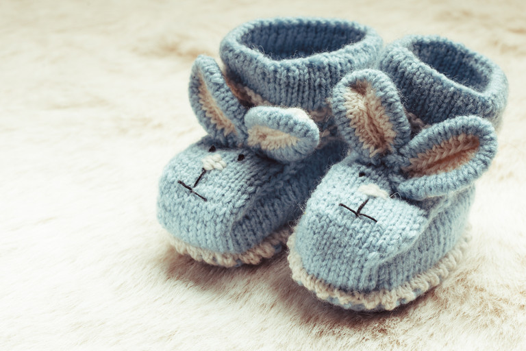 Years later, she repaid a small donation by hand-sewing baby clothes for a neighbor’s newborn  to show her gratitude.