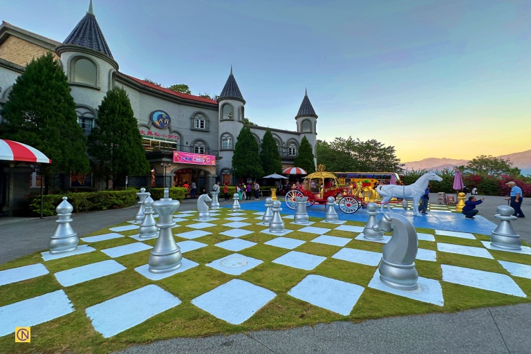 A giant outdoor chessboard that blends strategy, art, and fairytale charm is located in front of the Nougat Museum at King Garden.